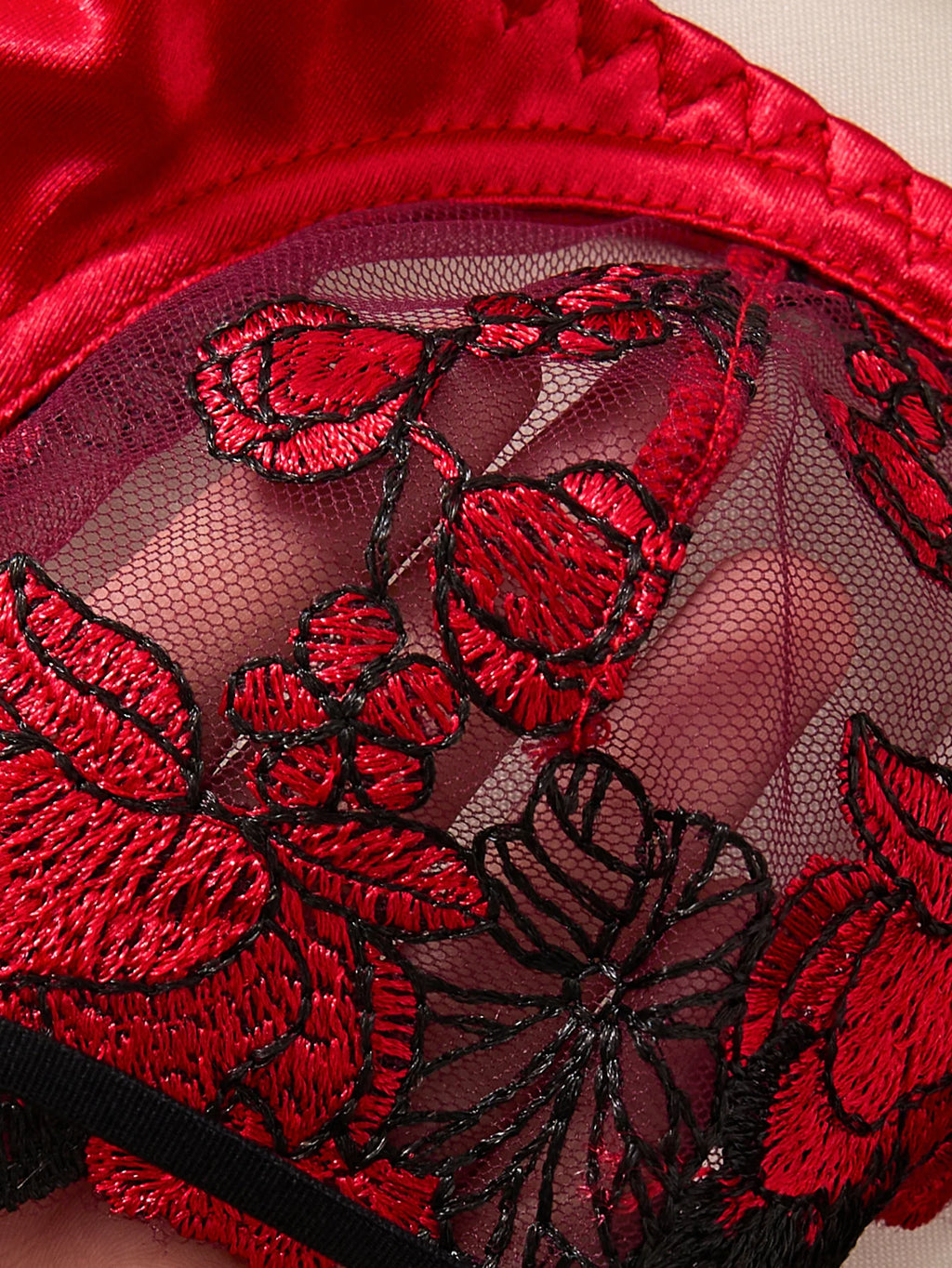 A set of sexy Red lingerie, including a bra and panties with daisy patterns, as well as a comfortable home-style