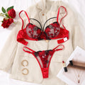 A set of sexy Red lingerie, including a bra and panties with daisy patterns, as well as a comfortable home-style