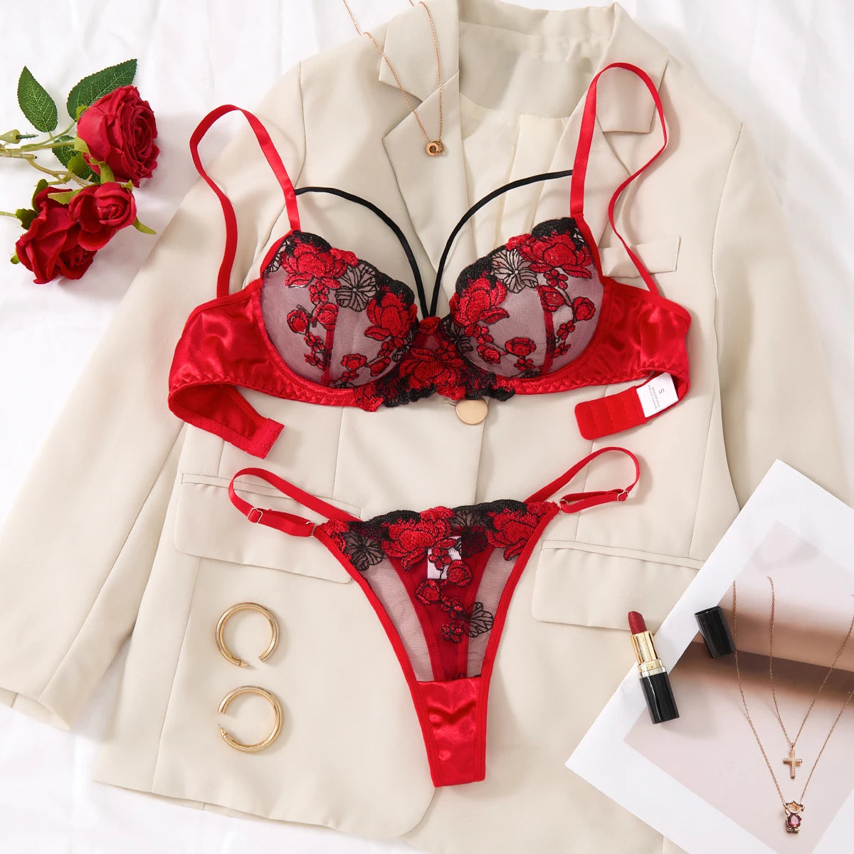 A set of sexy Red lingerie, including a bra and panties with daisy patterns, as well as a comfortable home-style