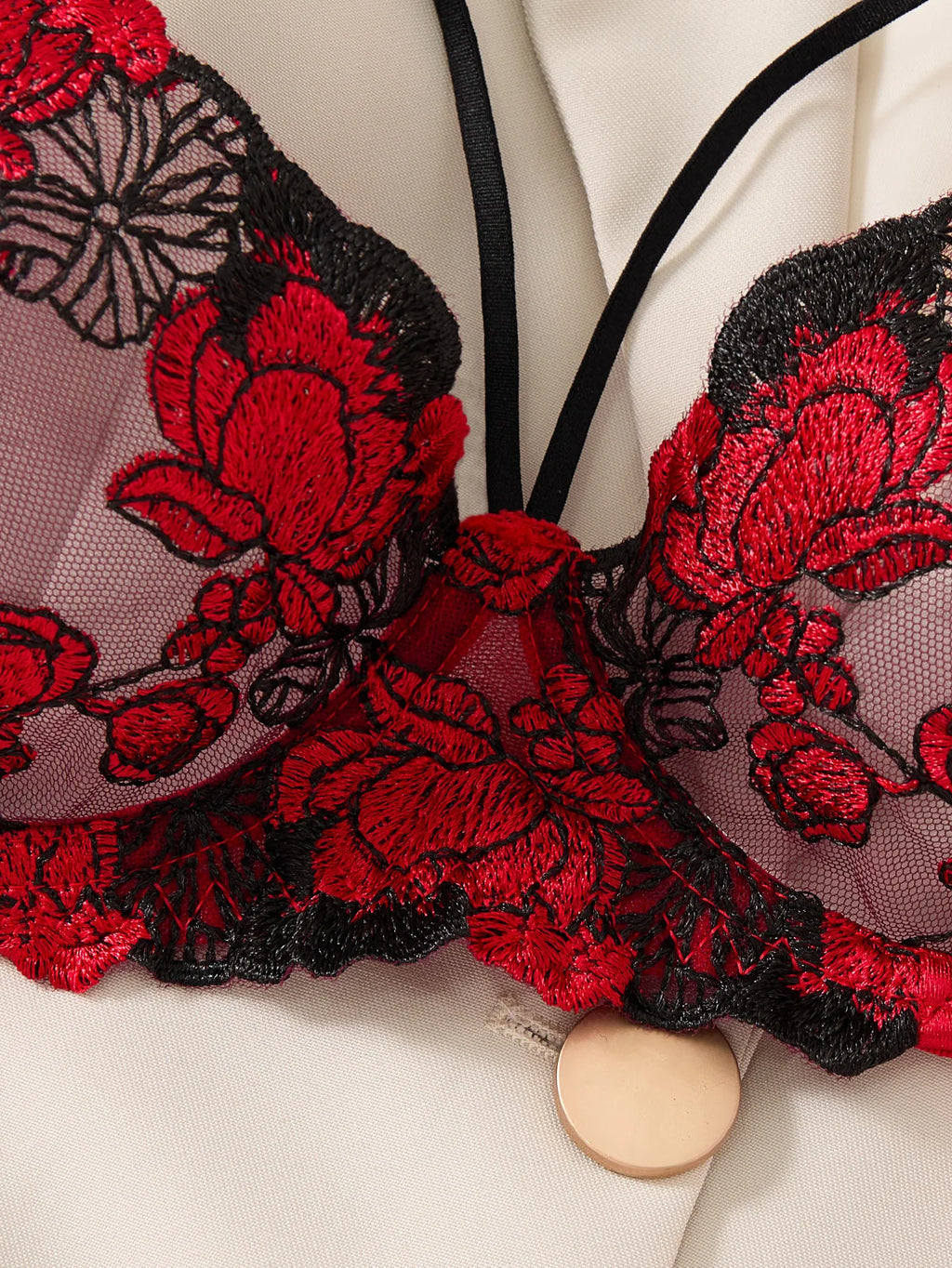 A set of sexy Red lingerie, including a bra and panties with daisy patterns, as well as a comfortable home-style