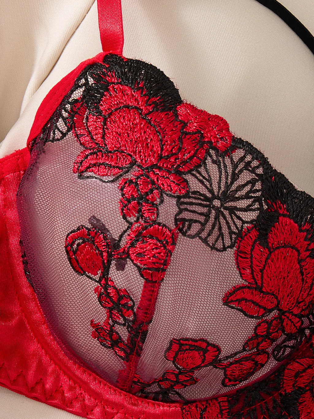 A set of sexy Red lingerie, including a bra and panties with daisy patterns, as well as a comfortable home-style